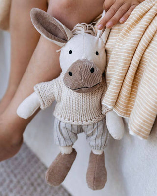 Baby with Cedric the Donkey heirloom soft toy – merino wool and linen – newborn baby gift – Babu