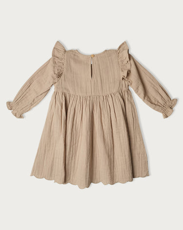 Organic cotton muslin long sleeve dress for girls in Oat neutral – GOTS certified double gauze – embroidered scallop and ruffle detail – Babu - front