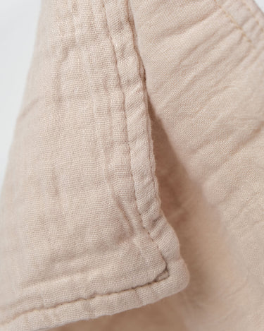 4 layer cotton muslin face cloth in Oat natural – soft exfoliating wash cloth for skincare – Babu – close up
