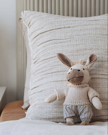 Cedric the Donkey heirloom soft toy – merino wool and linen – newborn baby gift – Babu - in bed